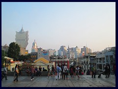 Macau skyline and numerous tourists seen from Ruinas de São Paulo.